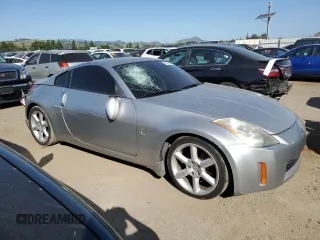 2003 Nissan 350Z Touring z VIN JN1AZ34E73T016672, wystawiony jako Copart lot #52968375 z przebiegiem 125 844 mil mil oraz Szkoda całkowita • Salvage title. Historia ofert i sprzedaży dostępna na DreamBid. Obrazek 4.