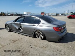 2018 BMW 7 Series 740e xDrive iPerformance with VIN WBA7J2C54JG938233, listed as a Copart auction lot 72694354 with 83,122 mi miles and Salvage Title. Bid and sale history available at carsss.com. Image 2.