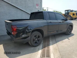 2023 Honda Ridgeline Black Edition with VIN 5FPYK3F84PB016684, listed as a Copart auction lot 58999785 with 45,171 mi miles and Salvage title. Bid and sale history available at DreamBid. Image 3.