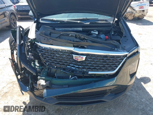 2025 Cadillac XT4 FWD Premium Luxury z VIN 1GYFZCR47SF146106, wystawiony jako IAAI lot #42324320 z przebiegiem 4 601 mil mil oraz . Historia ofert i sprzedaży dostępna na DreamBid. Obrazek 6.