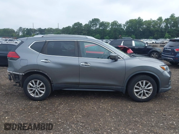 2017 Nissan Rogue S with VIN KNMAT2MV2HP581419, listed as a IAAI auction lot 42671858 with 121,308 mi miles and . Bid and sale history available at DreamBid. Image 13.