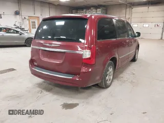2012 Chrysler Town & Country Touring with VIN 2C4RC1BG1CR314023, listed as a IAAI auction lot 41078817 with Not Provided miles and . Bid and sale history available at DreamBid. Image 4.