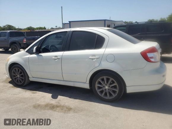 2009 Suzuki SX4 z VIN JS2YC416396200021, wystawiony jako Copart lot #56676075 z przebiegiem 150 981 mil mil oraz Szkoda całkowita • Salvage title. Historia ofert i sprzedaży dostępna na DreamBid. Obrazek 2.