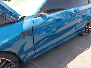 2018 BMW M2 z VIN WBS1J5C59JVE51997, wystawiony jako IAAI lot #42348421 z przebiegiem 51 376 mil mil oraz . Historia ofert i sprzedaży dostępna na DreamBid. Obrazek 6.