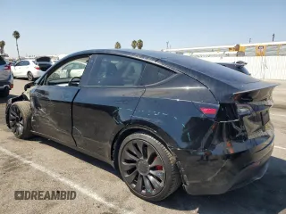 2022 Tesla Model Y Performance with VIN 7SAYGDEF4NF436834, listed as a Copart auction lot 68992234 with 22,171 mi miles and Salvage title. Bid and sale history available at DreamBid. Image 2.