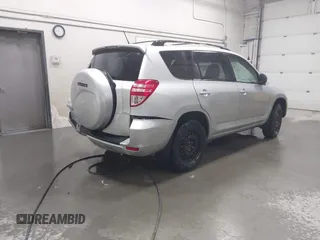 2012 Toyota RAV4 with VIN 2T3BF4DV5CW214468, listed as a IAAI auction lot 42075543 with 115,928 mi miles. Bid and sale history available at carsss.com. Image 4.