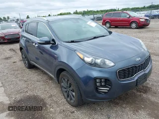 2018 Kia Sportage EX with VIN KNDPNCAC3J7456092, listed as a IAAI auction lot 42322303 with 96,049 mi miles and . Bid and sale history available at DreamBid. Image 1.