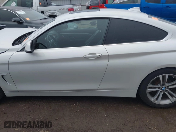 2016 BMW 4 Series 428i with VIN WBA3N7C54GK227475, listed as a IAAI auction lot 40963425 with 87,408 mi miles and . Bid and sale history available at carsss.com. Image 14.