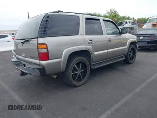 2002 Chevrolet Tahoe LS with VIN 1GNEC13ZX2J265803, listed as a IAAI auction lot 42571325 with 265,954 mi miles and . Bid and sale history available at DreamBid. Image 4.