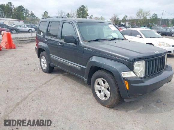 2011 Jeep Liberty Sport Jet with VIN 1J4PN2GKXBW538945, listed as a IAAI auction lot 41955317 with 133,772 mi miles and . Bid and sale history available at DreamBid. Image 1.
