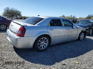 2005 Chrysler 300 with VIN 2C3AA63H95H657666, listed as a Copart auction lot 47989065 with 195,184 mi miles and Salvage Title. Bid and sale history available at carsss.com. Image 3.