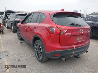 2016 Mazda CX-5 Grand Touring with VIN JM3KE2DY8G0871574, listed as a IAAI auction lot 41959686 with 95,416 mi miles and . Bid and sale history available at DreamBid. Image 3.