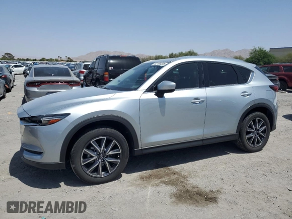 2018 Mazda CX-5 Grand Touring with VIN JM3KFBDM0J0377243, listed as a Copart auction lot 62199295 with 37,930 mi miles and Salvage title. Bid and sale history available at DreamBid. Image 1.