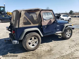 2002 Jeep Wrangler X with VIN 1J4FA39S82P735388, listed as a Copart auction lot 49511065 with 213,957 mi miles and Clean Title. Bid and sale history available at carsss.com. Image 3.