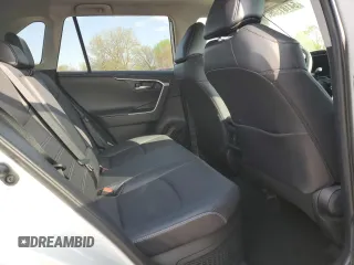2020 Toyota RAV4 Hybrid Limited z VIN 4T3DWRFV0LU004797, wystawiony jako Copart lot #54181595 z przebiegiem 63 055 mil mil oraz Szkoda całkowita • Salvage title. Historia ofert i sprzedaży dostępna na DreamBid. Obrazek 11.