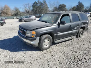 2000 GMC Yukon SLE with VIN 1GKEK13T3YJ107596, listed as a Copart auction lot 83326244 with 293,602 mi miles and Salvage Title. Bid and sale history available at carsss.com. Image 1.