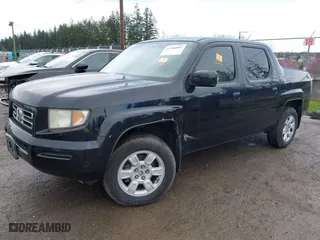 2006 Honda Ridgeline RTL with VIN 2HJYK16596H530876, listed as a IAAI auction lot 41906807 with 1 mi miles. Bid and sale history available at carsss.com. Image 2.