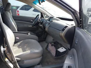 2006 Toyota Prius with VIN JTDKB20UX67525780, listed as a IAAI auction lot 42055112 with 157,100 mi miles. Bid and sale history available at carsss.com. Image 5.