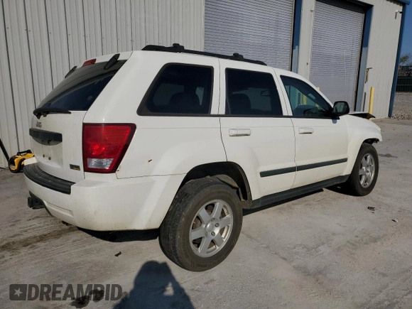 2009 Jeep Grand Cherokee Laredo with VIN 1J8HR48P89C532571, listed as a Copart auction lot 57309544 with 203,423 mi miles and Non Repairable. Bid and sale history available at carsss.com. Image 3.