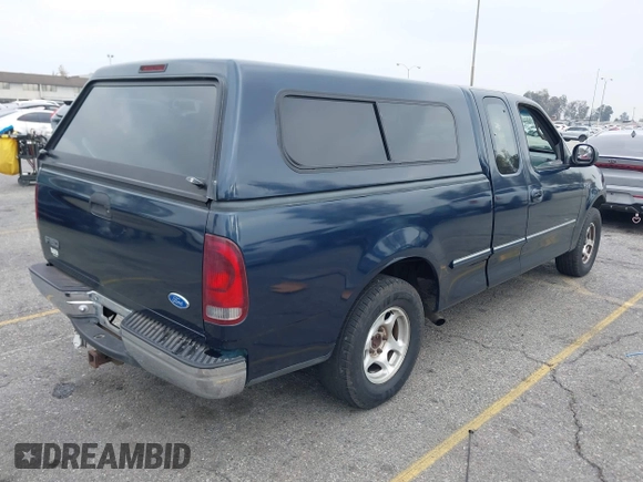 1997 Ford F-150 with VIN 1FTDX1725VKA52830, listed as a IAAI auction lot 41462465 with 169,379 mi miles and . Bid and sale history available at DreamBid. Image 4.