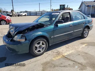 1997 Honda Civic LX z VIN 2HGEJ6675VH519723, wystawiony jako Copart lot #50602875 z przebiegiem 212 080 mil mil oraz Szkoda całkowita • Salvage title. Historia ofert i sprzedaży dostępna na DreamBid. Obrazek 1.