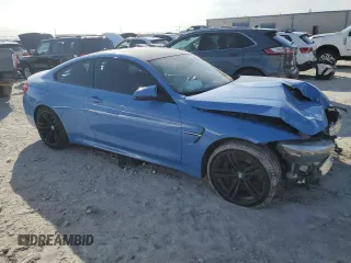 2018 BMW M4 with VIN WBS4Y9C51JAC87281, listed as a Copart auction lot 40663874 with 53,003 mi miles. Bid and sale history available at carsss.com. Image 4.