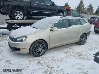 2012 Volkswagen Jetta SportWagen TDI with VIN 3VWML7AJ5CM700085, listed as a IAAI auction lot 41357976 with 128,786 mi miles. Bid and sale history available at carsss.com. Image 18.