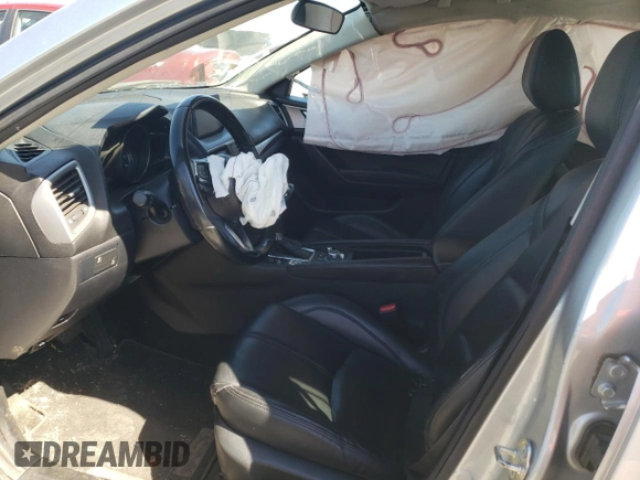 2017 Mazda 3 Touring z VIN 3MZBN1V79HM119726, wystawiony jako Copart lot #60819782 z przebiegiem 108 939 mil mil oraz Szkoda całkowita • Salvage title. Historia ofert i sprzedaży dostępna na DreamBid. Obrazek 5.