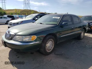 1998 Lincoln Continental with VIN 1LNFM97V8WY707809, listed as a Copart auction lot 70842654 with 175,066 mi miles and Salvage Title. Bid and sale history available at carsss.com. Image 1.