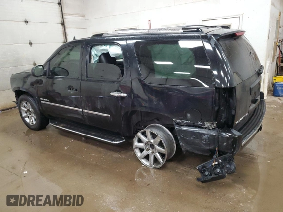 2012 GMC Yukon Denali with VIN 1GKS1EEFXCR126256, listed as a Copart auction lot 88656765 with 203,007 mi miles and Clean Title. Bid and sale history available at carsss.com. Image 2.