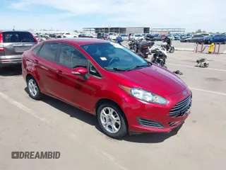 2015 Ford Fiesta SE with VIN 3FADP4BJ4FM149307, listed as a IAAI auction lot 42078091 with 124,529 mi miles. Bid and sale history available at carsss.com. Image 1.