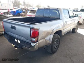 2018 Toyota Tacoma SR5 with VIN 3TMAZ5CN6JM056201, listed as a IAAI auction lot 41626663 with 55,599 mi miles. Bid and sale history available at carsss.com. Image 4.
