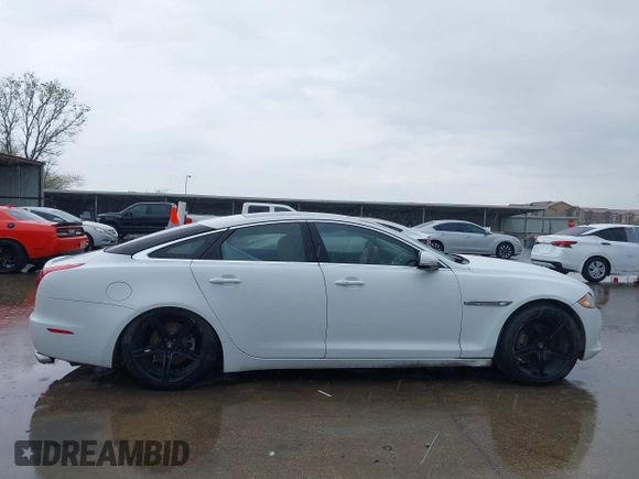 2012 Jaguar XJ with VIN SAJWA1CB7CLV35339, listed as a IAAI auction lot 41945850 with 123,501 mi miles and . Bid and sale history available at DreamBid. Image 14.