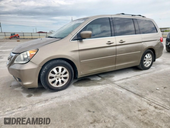 2008 Honda Odyssey EX-L z VIN 5FNRL38718B402236, wystawiony jako Copart lot #59355585 z przebiegiem 131 558 mil mil oraz Czysty tytuł • Clean title. Historia ofert i sprzedaży dostępna na DreamBid. Obrazek 1.