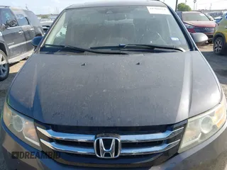 2015 Honda Odyssey EX-L with VIN 5FNRL5H67FB130663, listed as a IAAI auction lot 41988034 with 180,254 mi miles and . Bid and sale history available at carsss.com. Image 6.