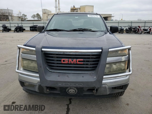 2007 GMC Canyon SLE1 z VIN 1GTDS13E178129031, wystawiony jako Copart lot #44825775 z przebiegiem 249 940 mil mil oraz Czysty tytuł • Clean title. Historia ofert i sprzedaży dostępna na DreamBid. Obrazek 5.