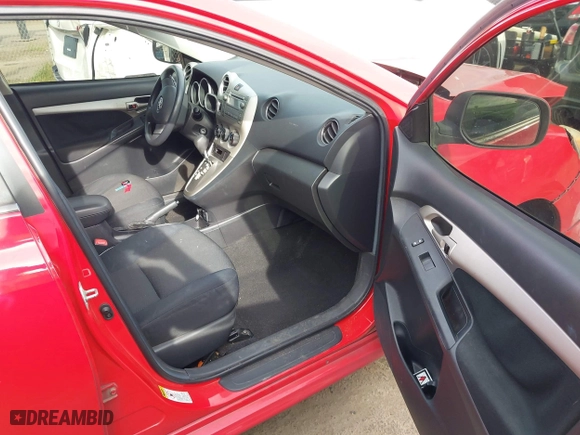 2009 Toyota Matrix S with VIN 2T1KE40E09C014254, listed as a IAAI auction lot 41687572 with 161,076 mi miles. Bid and sale history available at carsss.com. Image 5.