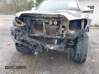2016 Toyota Tacoma SR with VIN 5TFCZ5AN2GX012937, listed as a IAAI auction lot 41963728 with 157,397 mi miles and . Bid and sale history available at DreamBid. Image 6.