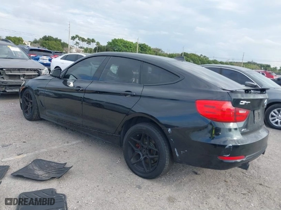 2014 BMW 3 Series Gran Turismo 335i xDrive with VIN WBA3X9C58ED153467, listed as a IAAI auction lot 41609246 with 219,204 mi miles. Bid and sale history available at carsss.com. Image 3.