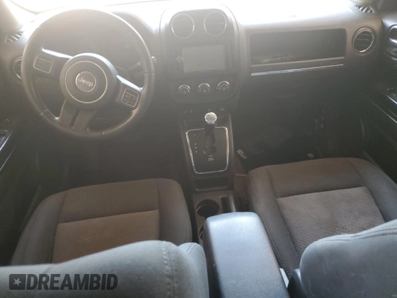 2014 Jeep Patriot Latitude with VIN 1C4NJRFB3ED792919, listed as a Copart auction lot 66043945 with 142,224 mi miles and Salvage title. Bid and sale history available at DreamBid. Image 8.