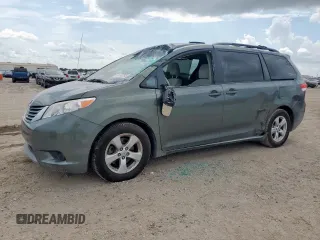 2014 Toyota Sienna LE AAS with VIN 5TDKK3DC1ES423053, listed as a Copart auction lot 63492095 with 142,589 mi miles and Salvage title. Bid and sale history available at DreamBid. Image 1.