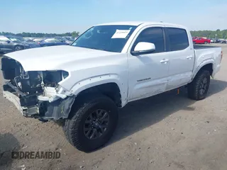 2023 Toyota Tacoma SR with VIN 3TYCZ5AN2PT112854, listed as a IAAI auction lot 42220025 with 43,657 mi miles and . Bid and sale history available at DreamBid. Image 23.