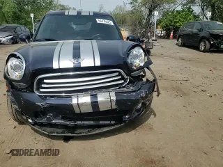 2014 MINI Countryman z VIN WMWZB3C55EWR42069, wystawiony jako Copart lot #54476425 z przebiegiem 42 218 mil mil oraz Szkoda całkowita • Salvage title. Historia ofert i sprzedaży dostępna na DreamBid. Obrazek 13.