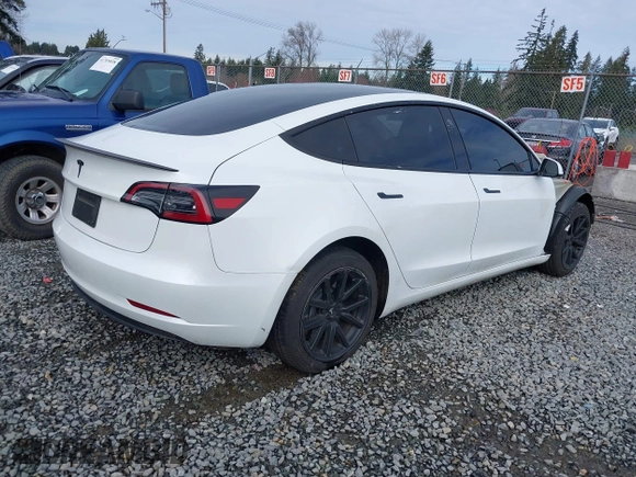 2023 Tesla Model 3 with VIN 5YJ3E1EA2PF612427, listed as a IAAI auction lot 41793756 with 17,913 mi miles and . Bid and sale history available at carsss.com. Image 4.