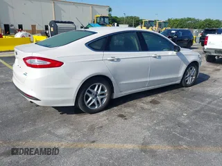 2014 Ford Fusion SE with VIN 3FA6P0HD5ER273039, listed as a IAAI auction lot 42221553 with 82,755 mi miles and . Bid and sale history available at DreamBid. Image 4.