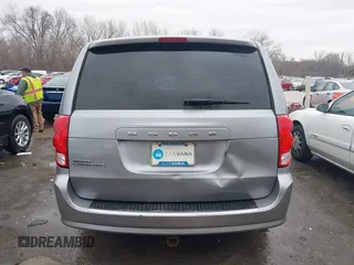 2014 Dodge Grand Caravan American Value with VIN 2C4RDGBG9ER187198, listed as a IAAI auction lot 41669334 with 204,803 mi miles and . Bid and sale history available at DreamBid. Image 17.