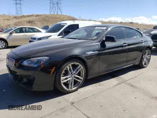 2015 BMW 6 Series 650i xDrive with VIN WBA6B4C55FD761124, listed as a Copart auction lot 50559555 with 49,735 mi miles and Salvage Title. Bid and sale history available at carsss.com. Image 1.