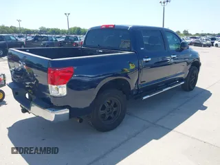 2011 Toyota Tundra z VIN 5TFEY5F17BX103583, wystawiony jako IAAI lot #42017676 z przebiegiem 158 466 mil mil oraz . Historia ofert i sprzedaży dostępna na DreamBid. Obrazek 4.