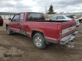 1991 GMC Sierra 1500 z VIN 2GTEK19K2M1543239, wystawiony jako Copart lot #51680075 z przebiegiem 135 361 mil mil oraz Czysty tytuł • Clean title. Historia ofert i sprzedaży dostępna na DreamBid. Obrazek 2.