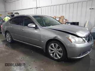 2006 Infiniti M z VIN JNKAY01E76M109160, wystawiony jako IAAI lot #41252984 z przebiegiem 134 744 mil mil oraz . Historia ofert i sprzedaży dostępna na DreamBid. Obrazek 13.